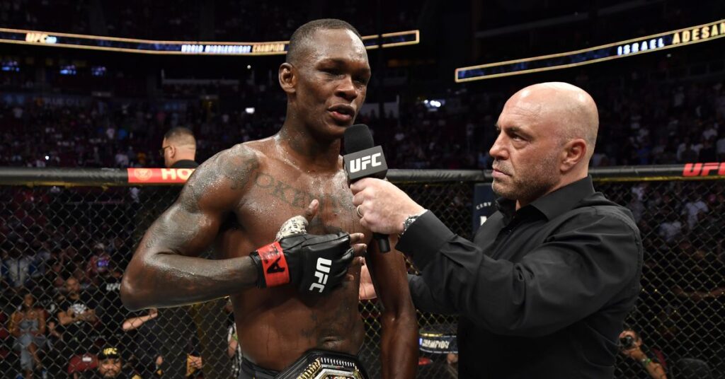 Martial Arts Clique MartialArtsClique Israel Adesanya vehemently defends Joe Rogan at UFC 271 presser ‘Fck the noise Israel Adesanya vehemently defends Joe Rogan at UFC 271 presser: ‘F*ck the noise’