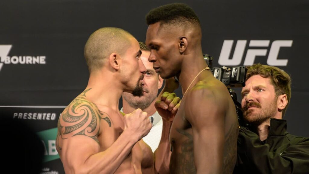 Martial Arts Clique MartialArtsClique UFC 271 Adesanya vs Whittaker 2 ceremonial weigh ins faceoff video FIGHTMAG UFC 271: Adesanya vs Whittaker 2 ceremonial weigh-ins & faceoff (video) - FIGHTMAG